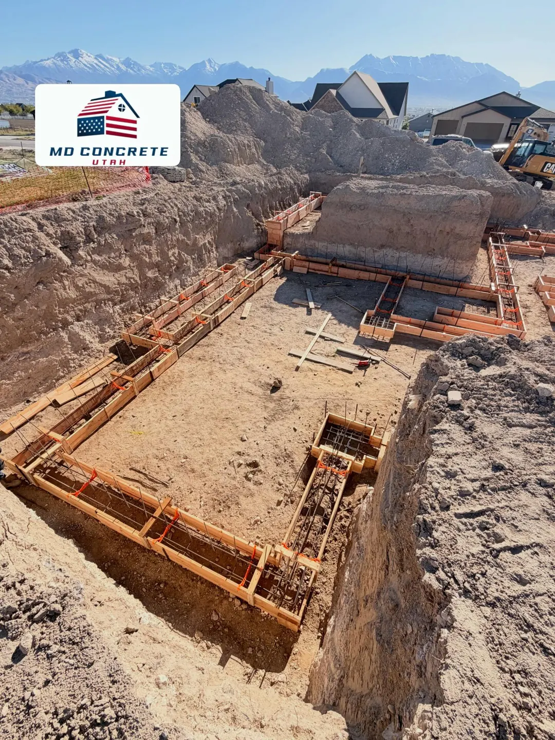 Footing forms and rebar in place by MD Concrete in Utah