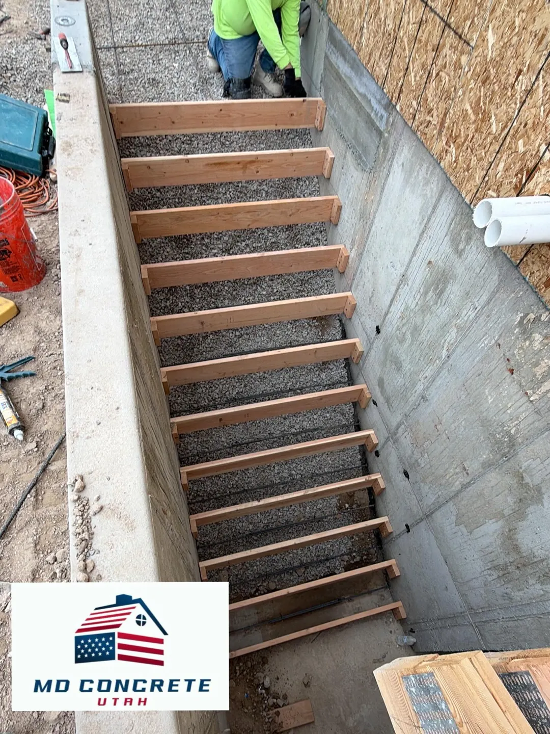 Wood forms set for concrete steps by MD Concrete in Utah