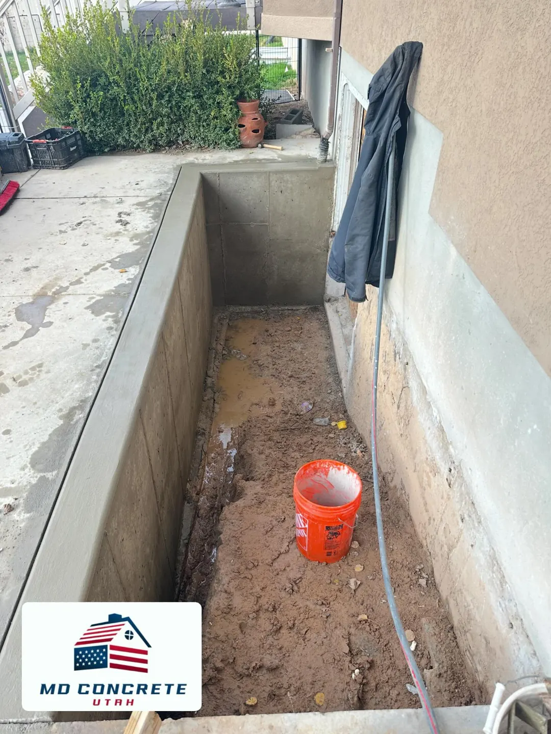 Walkout basement wall and footing by MD Concrete in Utah