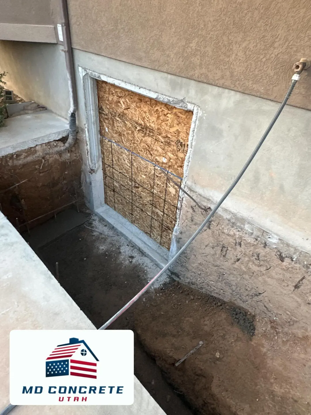 Concrete wall cut for a new door by MD Concrete in Utah