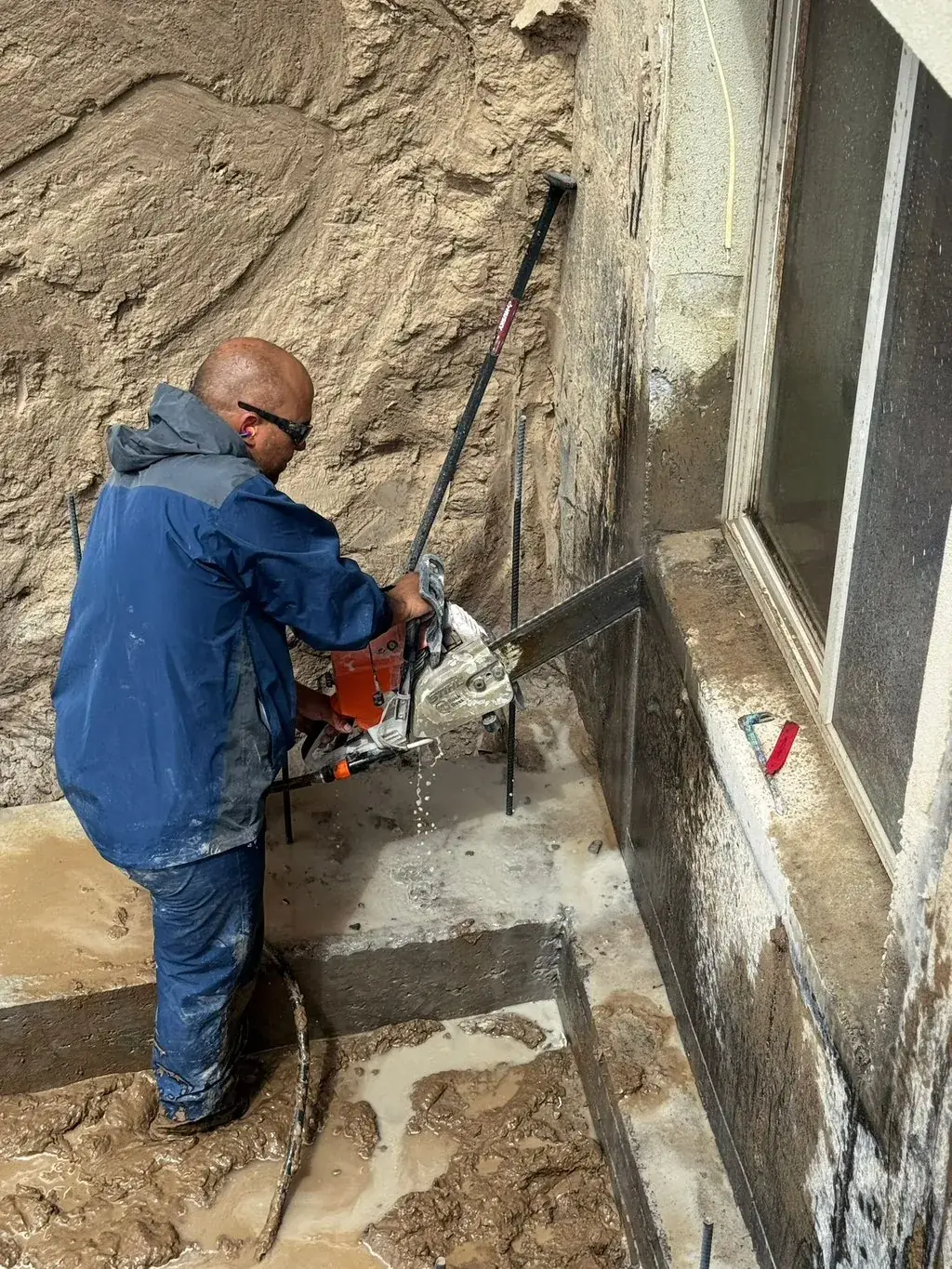 Cutting a basement wall by MD Concrete in Utah