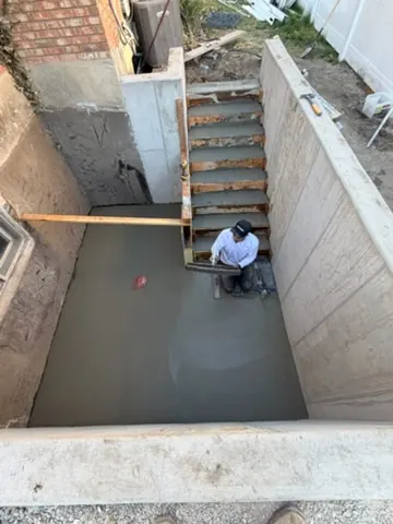 Concrete landing being finished by MD Concrete in Utah
