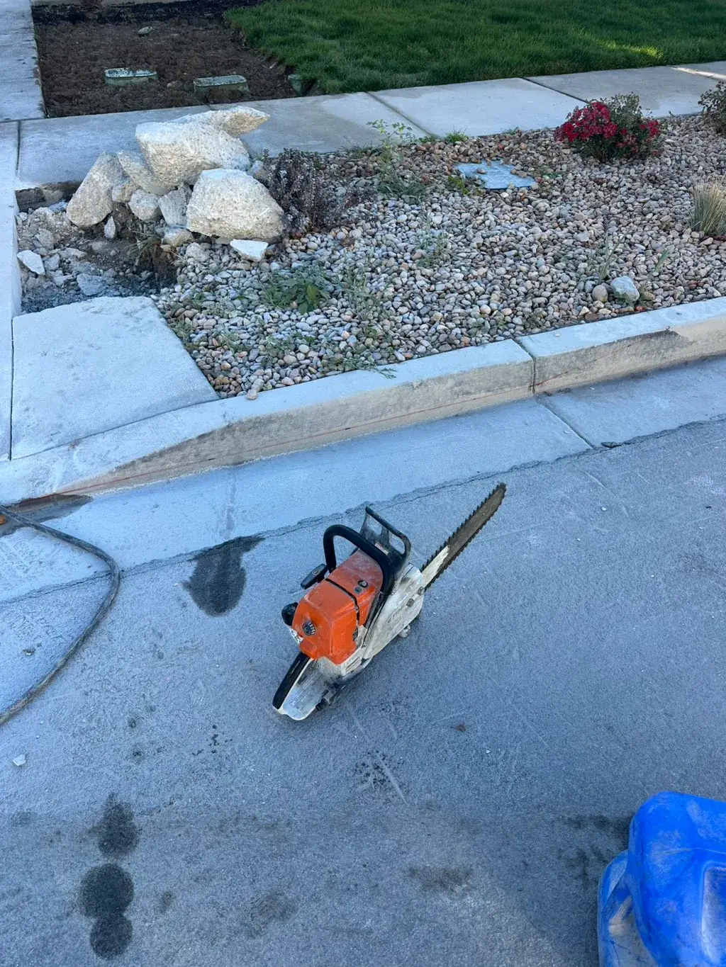 Saw ready to cut a curb by MD Concrete in Utah