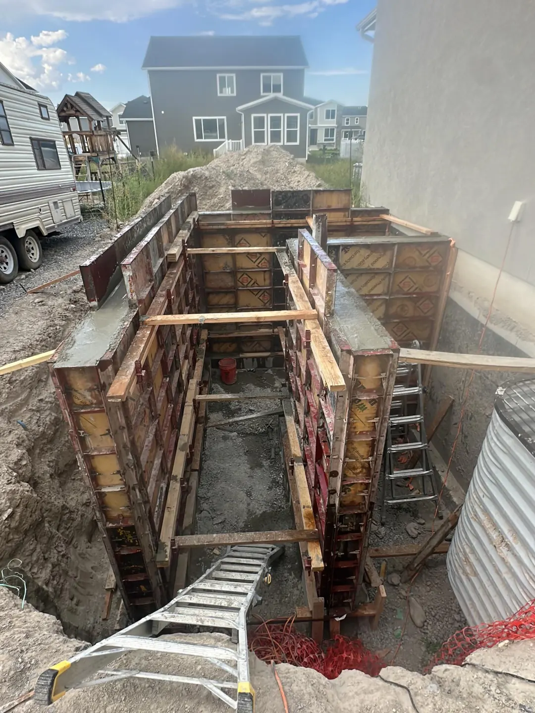 Forms set for walkout basement walls by MD Concrete in Utah