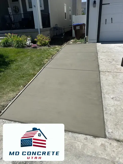 Smooth sidewalk with clean edges by MD Concrete in Utah
