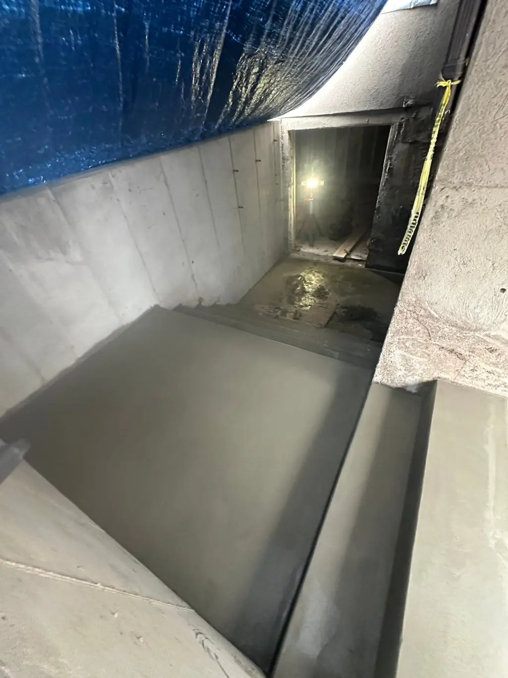 Fresh landing at a basement walkout by MD Concrete in Utah