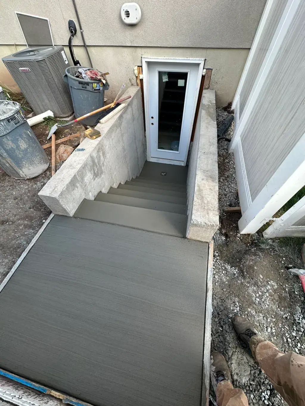 Finished walkout with a new door by MD Concrete in Utah