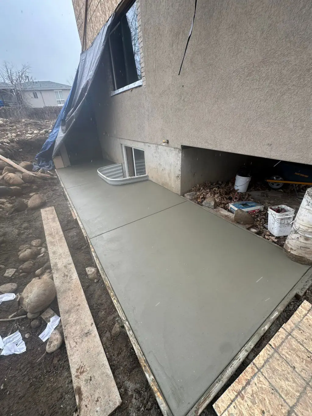 Fresh slab along the side of a home by MD Concrete in Utah