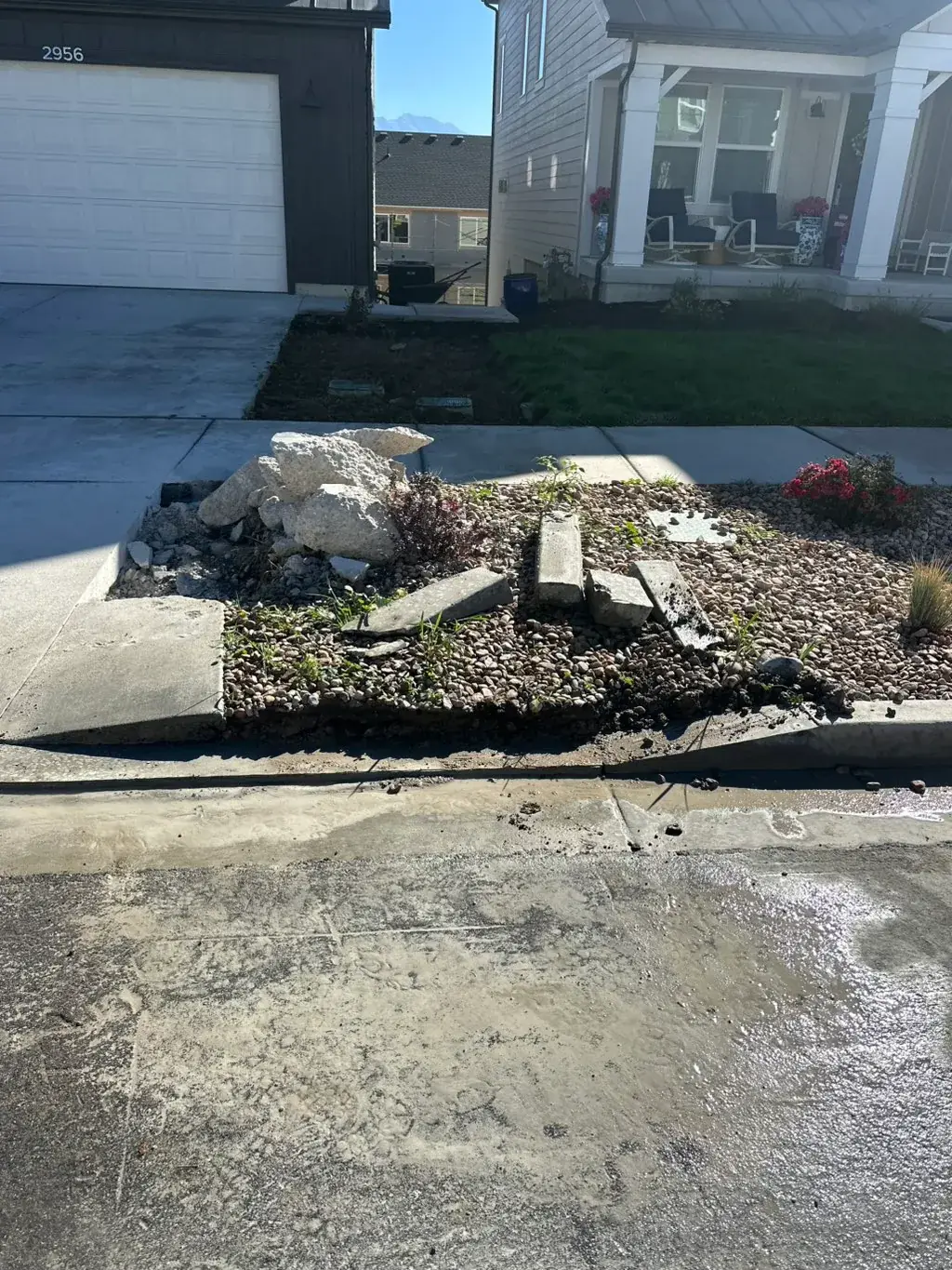 New driveway in front of a home by MD Concrete in Utah